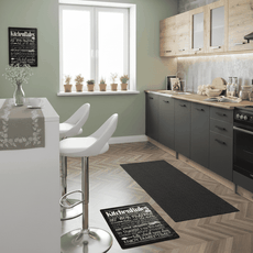 Green kitchen with a design touch
